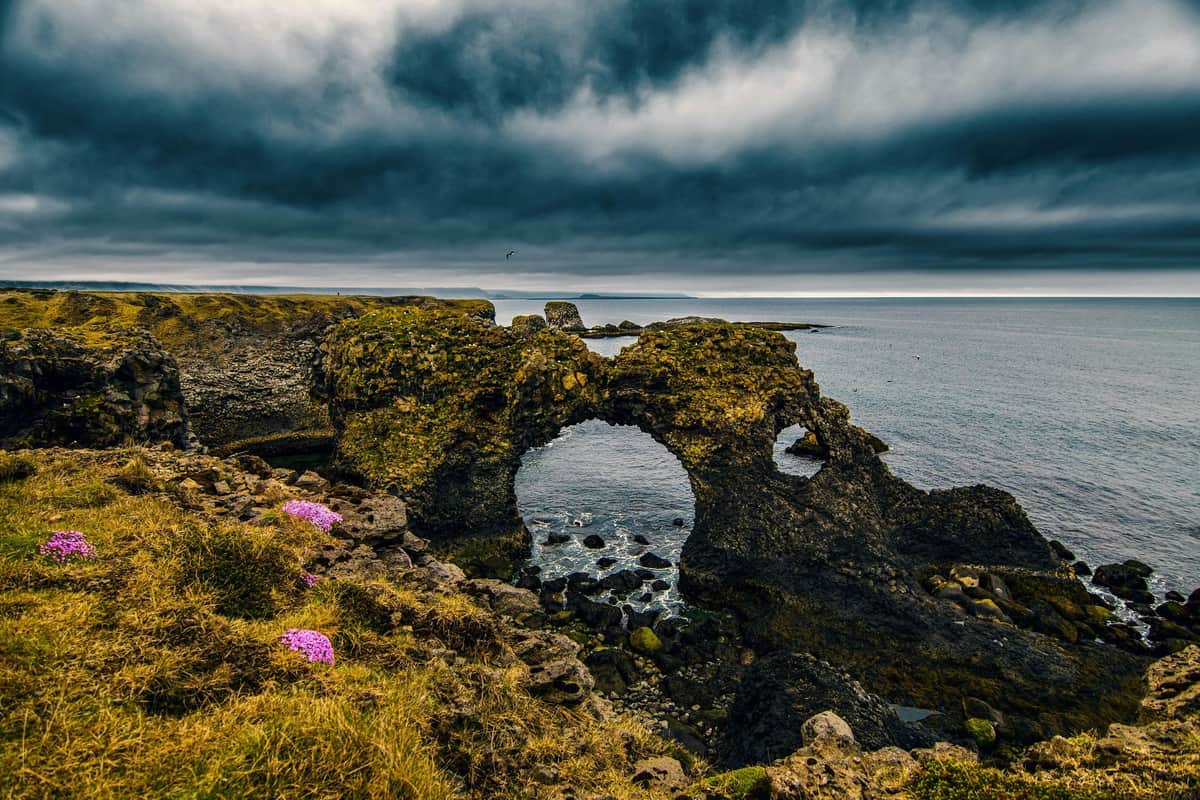 Explore Arnarstapi and see the amazing Arch Rock